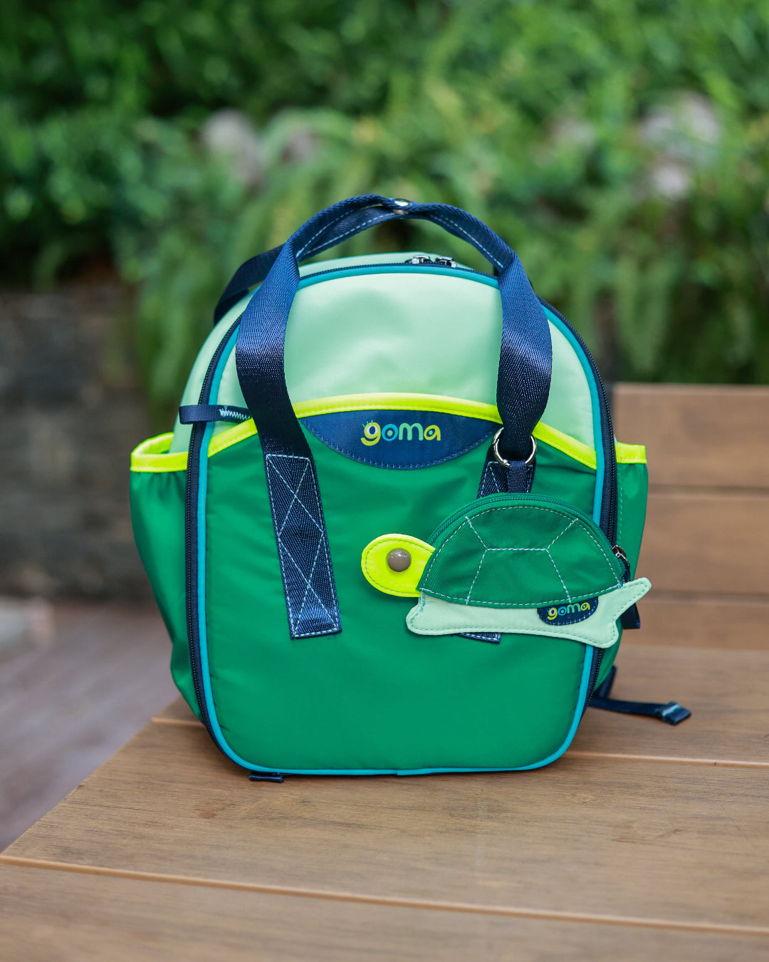 The goma kids backpack in Dino Green